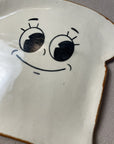 gros plan visage assiette madame heureuse