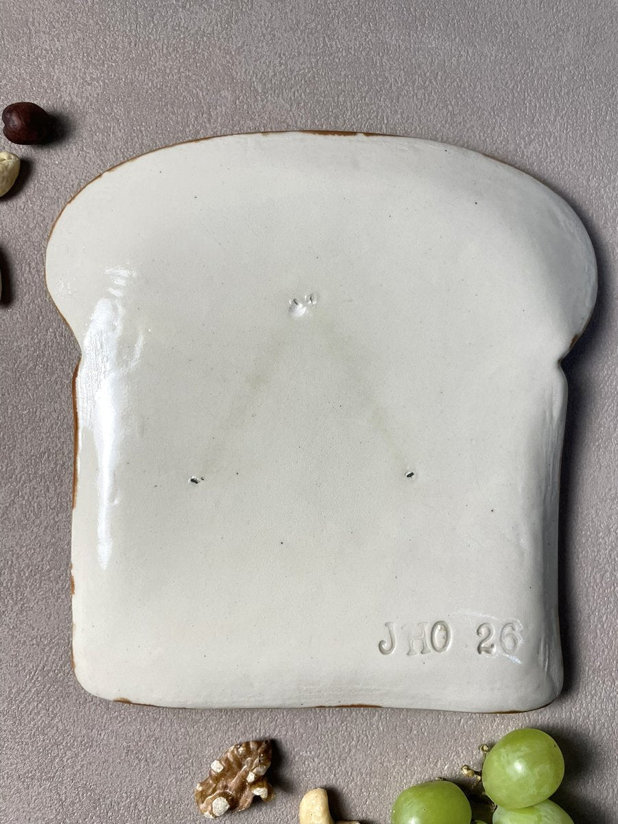 vue arrière assiette tartine madame timide