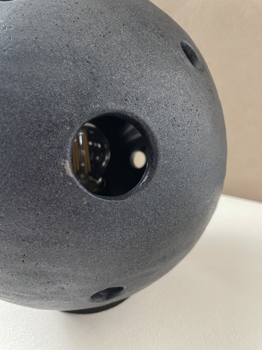 gros plan lampe effet granit