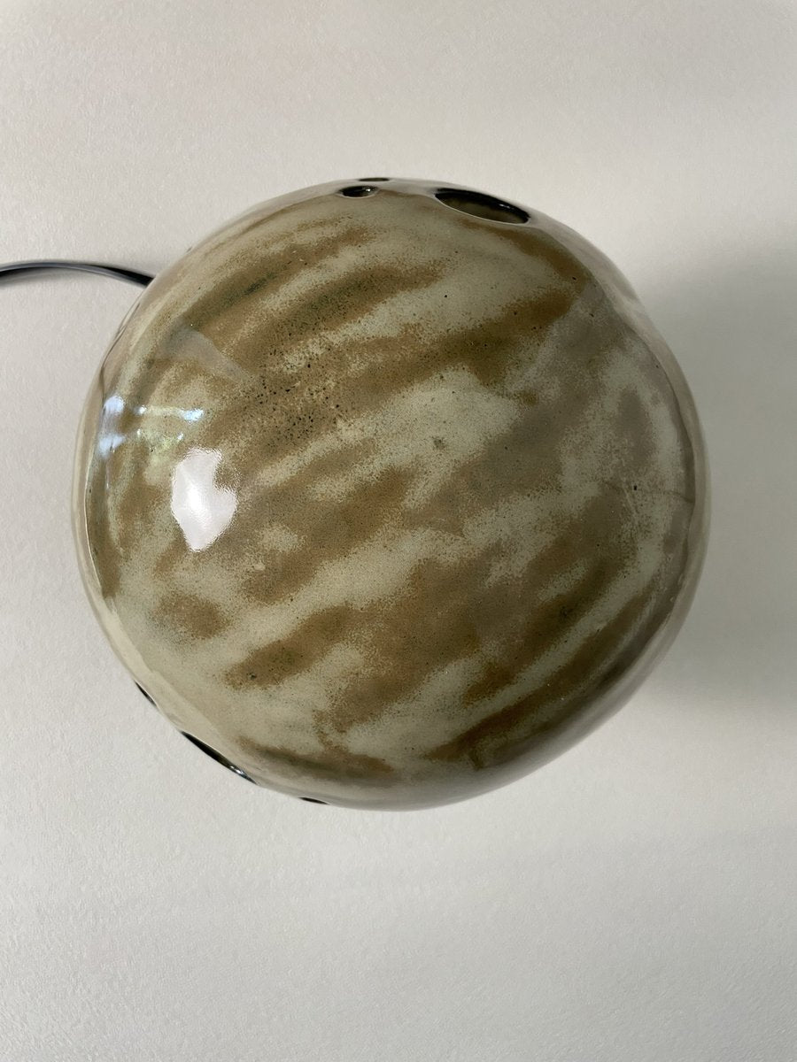 vue du dessus lampe en grès saturne